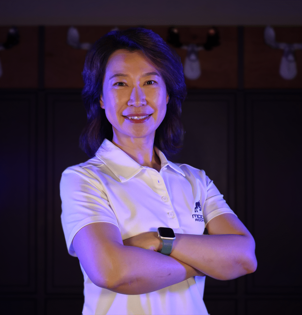 Professional Omaha roofing expert in branded attire smiling confidently.