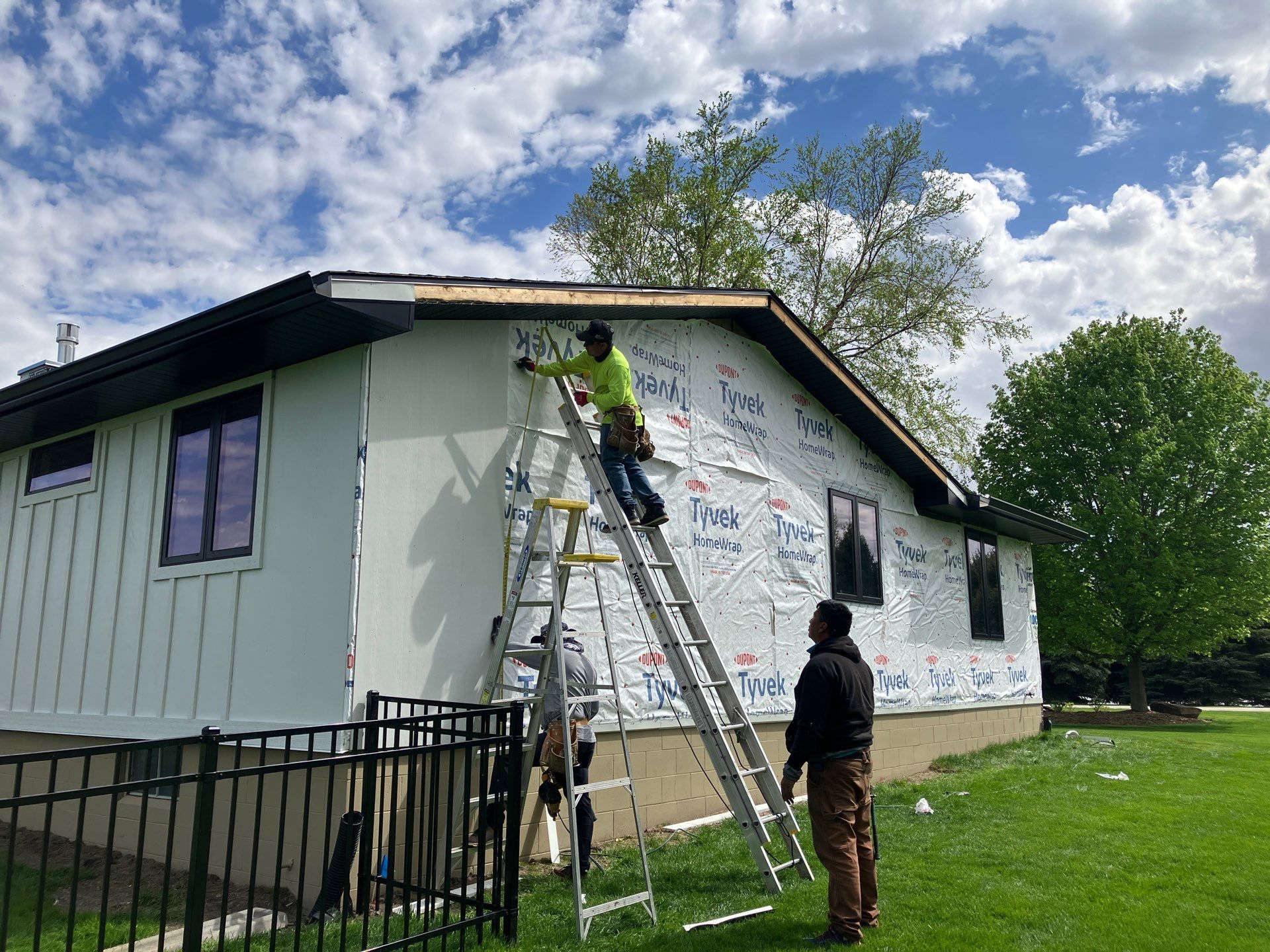 Moose Roofing crew completing a roofing project