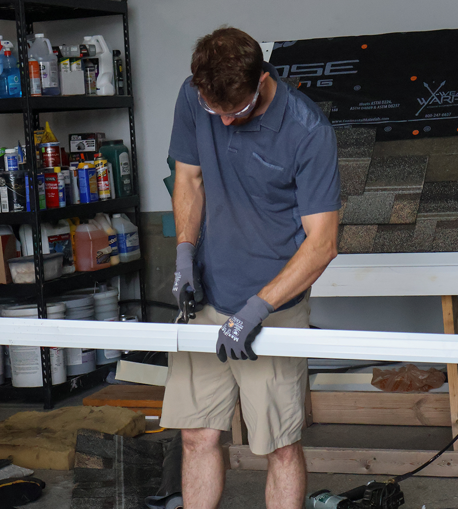 Mark Powell in the garage working