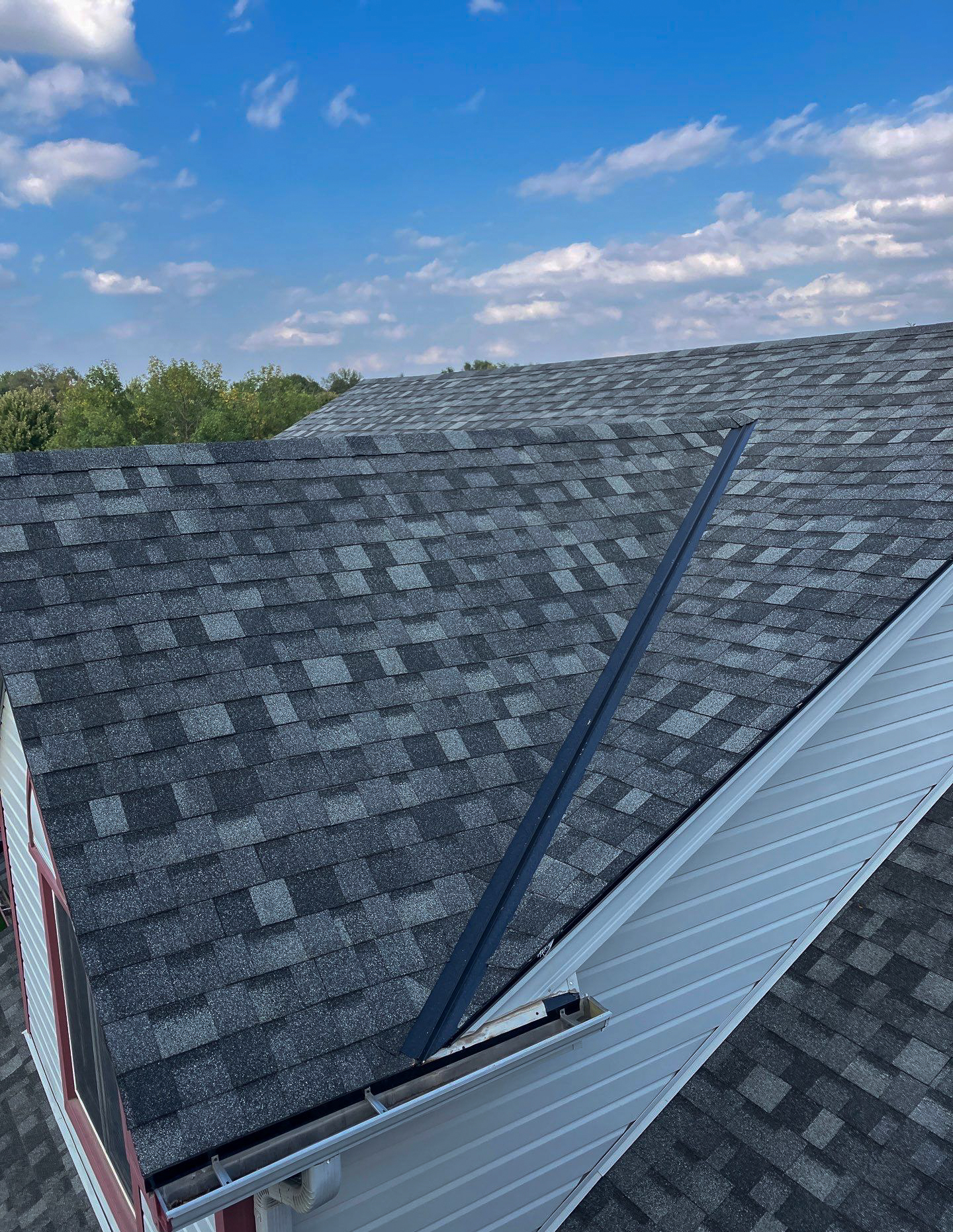 Completed residential roof replacement by Moose Roofing