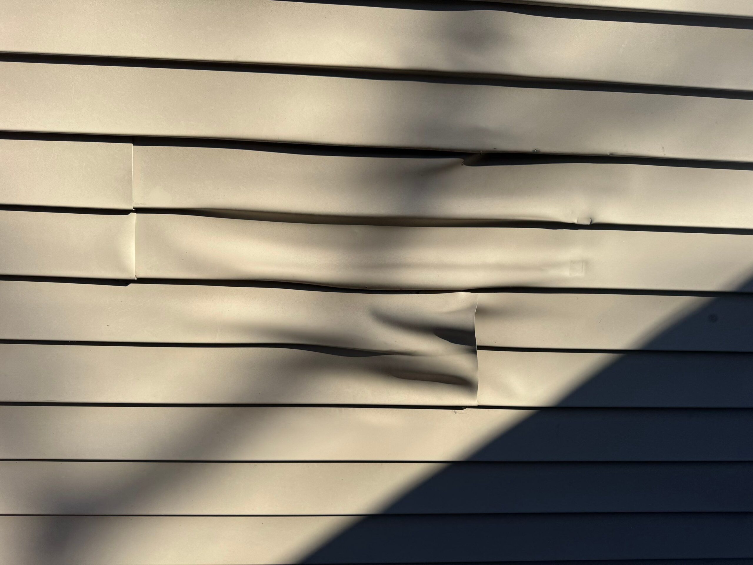 Why Is My Siding Warping or Buckling?