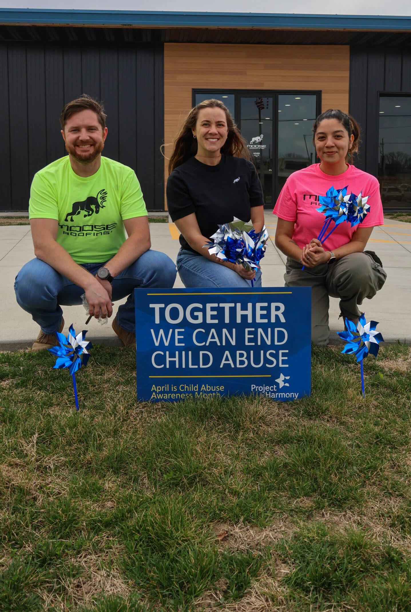 Moose Roofing employees working and spending time together