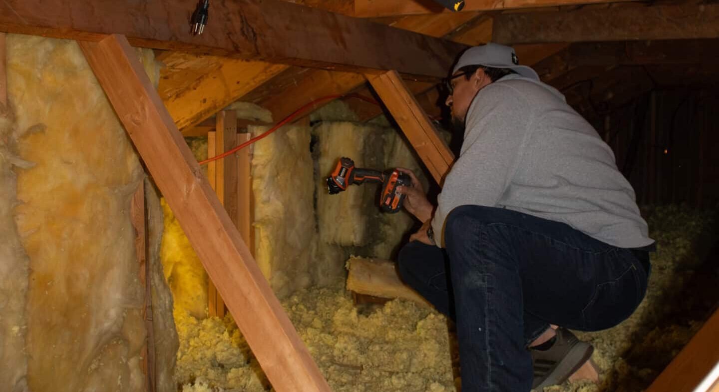Blown-in insulation evenly installed across a residential attic