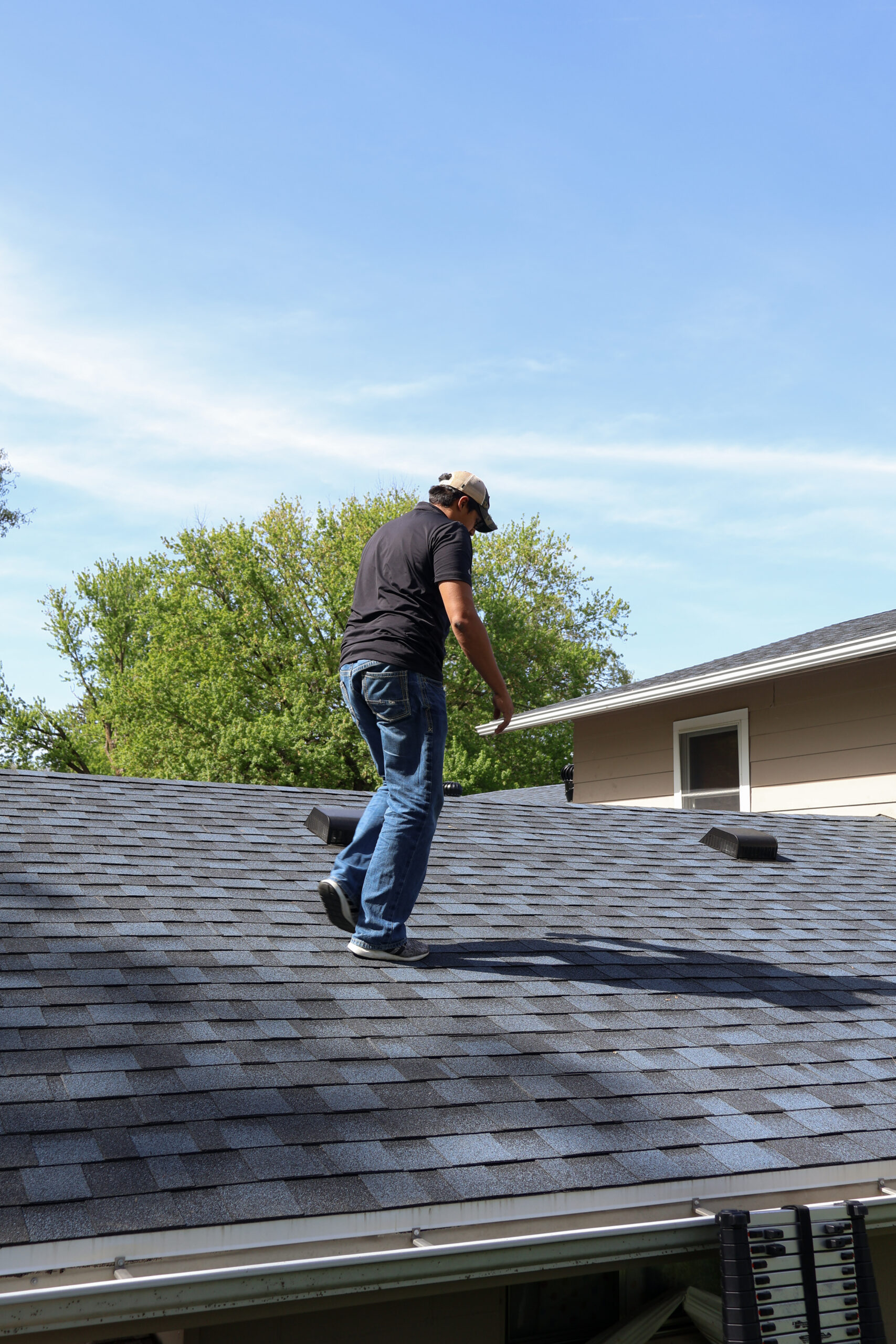 Moose Roofing professional inspecting attic ventilation and roof decking