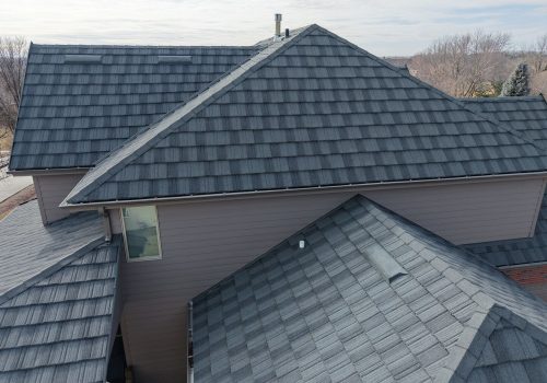 Modern home with a durable and stylish shingle roofing design.